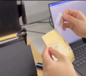 Peeling off sticker for manual packaging